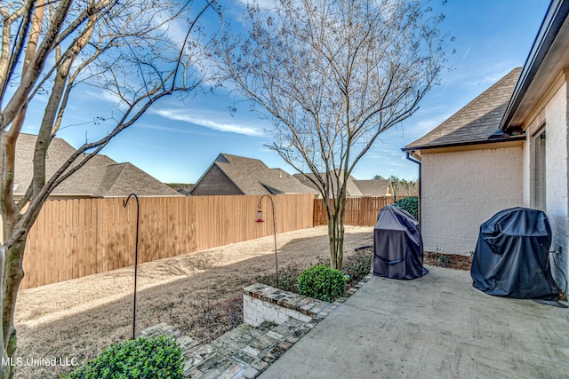 view of patio / terrace with a grill