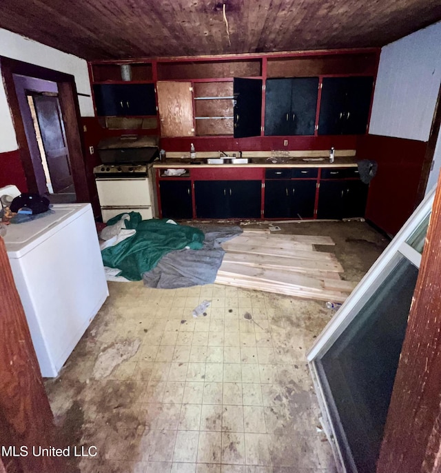204 Deaton St, Batesville, MS 38606 - kitchen featuring white range with gas cooktop, sink, wood ceiling, and fridge