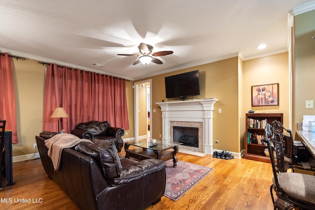 4788 Bon Jour Ln, Nesbit, MS 38651 - living area featuring ceiling fan, crown molding, a high end fireplace, wood finished floors, and baseboards