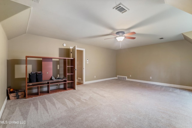 4788 Bon Jour Ln, Nesbit, MS 38651 - unfurnished living room featuring lofted ceiling, ceiling fan, carpet, and baseboards