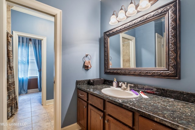 4788 Bon Jour Ln, Nesbit, MS 38651 - bathroom with vanity, tile patterned flooring, and baseboards