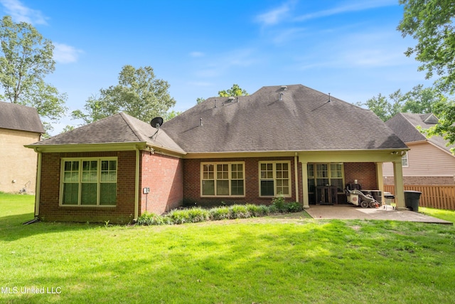 4788 Bon Jour Ln, Nesbit, MS 38651 - back of property with a patio area, brick siding, and a shingled roof