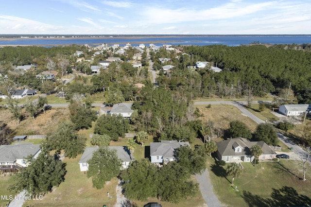 birds eye view of property with a residential view