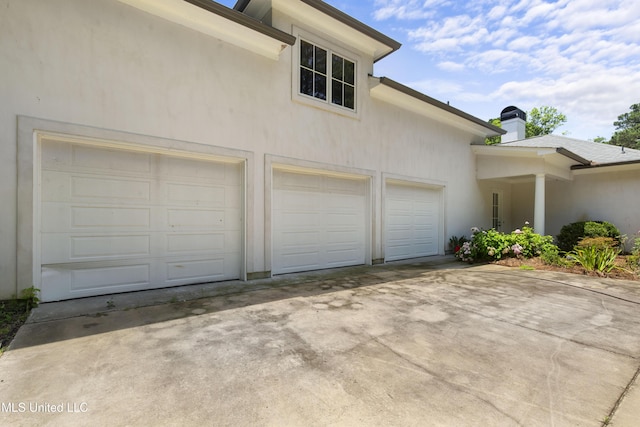 268 Sundial Rd, Madison, MS 39110 - garage featuring concrete driveway