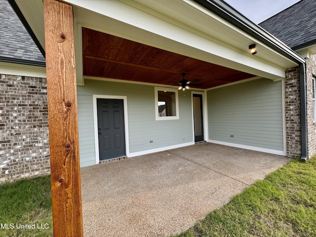 property entrance featuring ceiling fan and a patio area