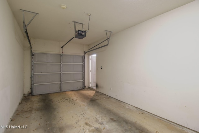 garage featuring a garage door opener