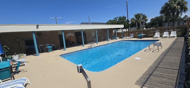 245 Mcdonnell Ave Unit D-226, Biloxi, MS 39531 - community pool with a patio and fence