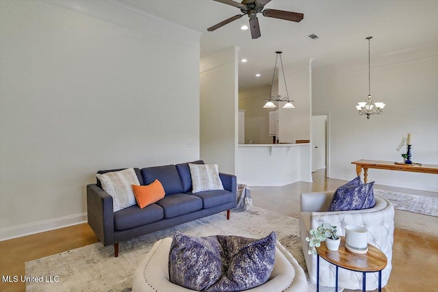 living room with ceiling fan with notable chandelier