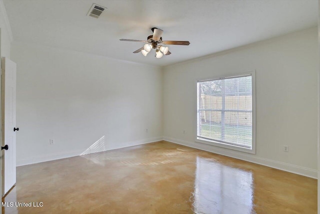 spare room featuring crown molding and ceiling fan