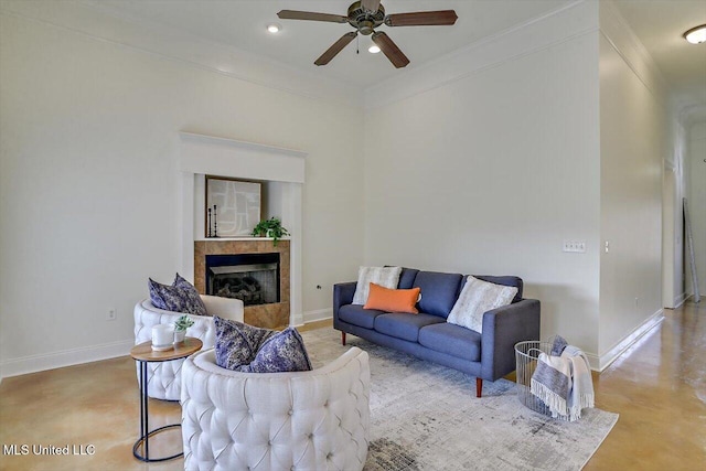 living room with ceiling fan and crown molding