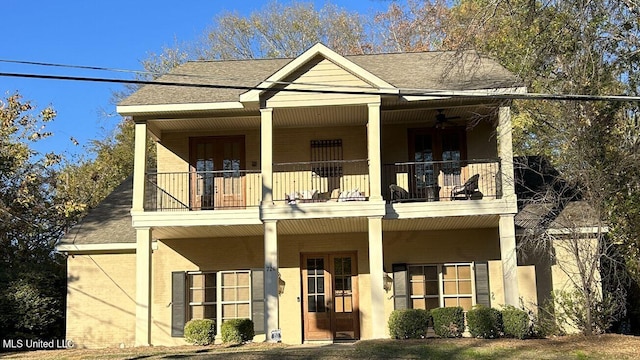 view of front facade with a balcony