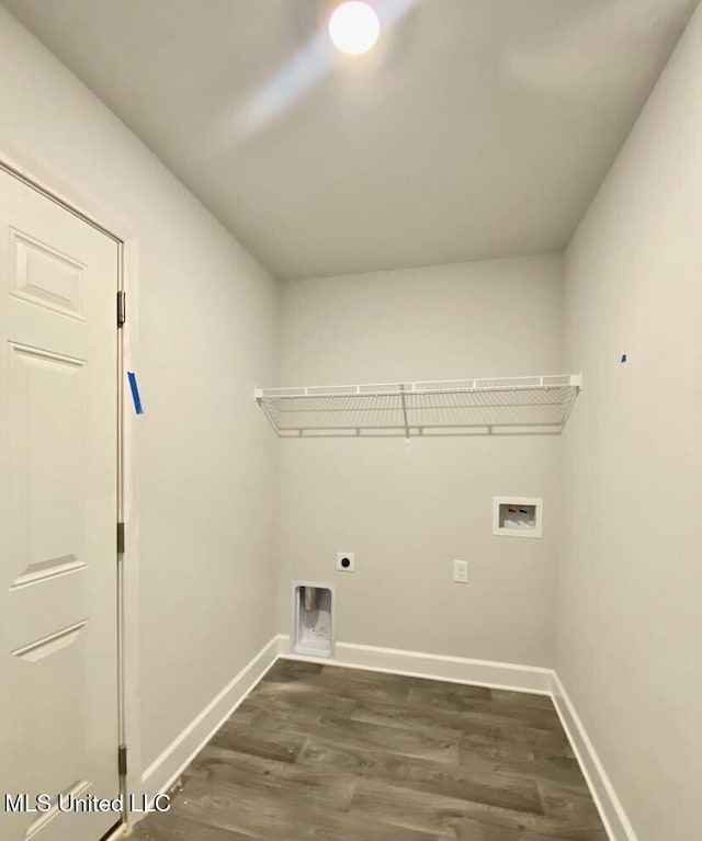 clothes washing area with baseboards, washer hookup, laundry area, hookup for an electric dryer, and dark wood-style flooring