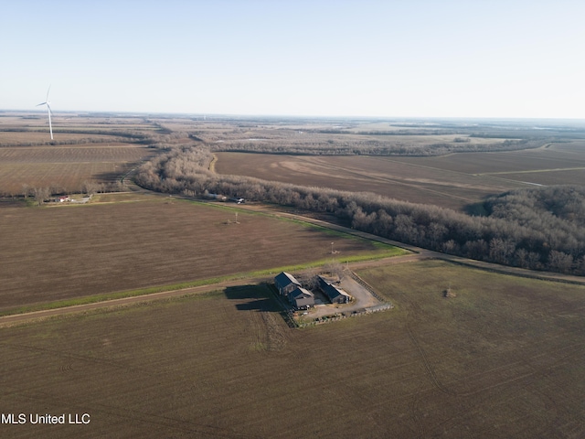 birds eye view of property with a rural view