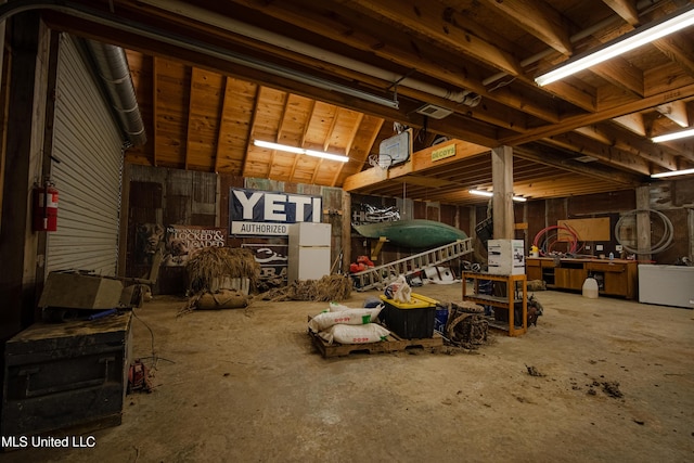 misc room featuring unfinished concrete floors