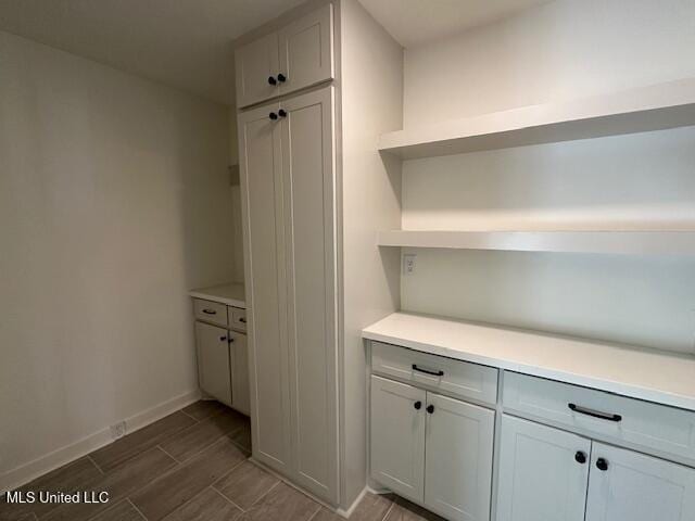 interior space featuring white cabinets