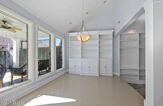 dining room with ceiling fan, ornamental molding, and built in features