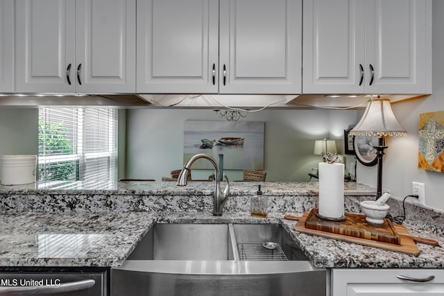 550 Post Rd Unit 116, Ridgeland, MS 39157 - kitchen with white cabinets, stainless steel dishwasher, and light stone countertops
