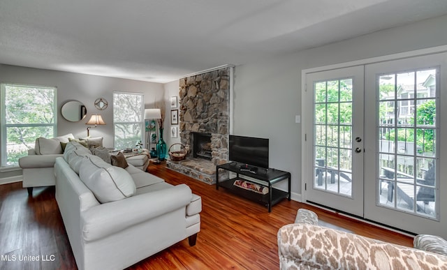550 Post Rd Unit 116, Ridgeland, MS 39157 - living room featuring french doors, wood finished floors, and a fireplace