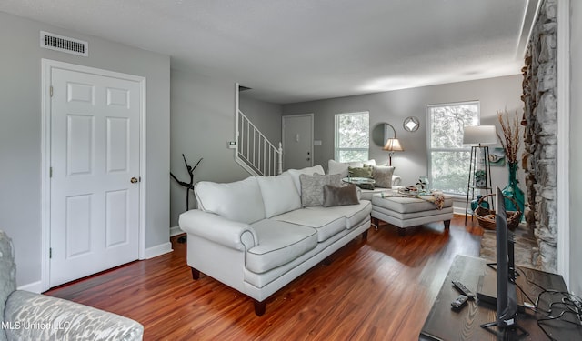 550 Post Rd Unit 116, Ridgeland, MS 39157 - living area featuring wood finished floors and stairway