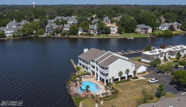 550 Post Rd Unit 116, Ridgeland, MS 39157 - aerial view of residential area featuring a large body of water and a pool area