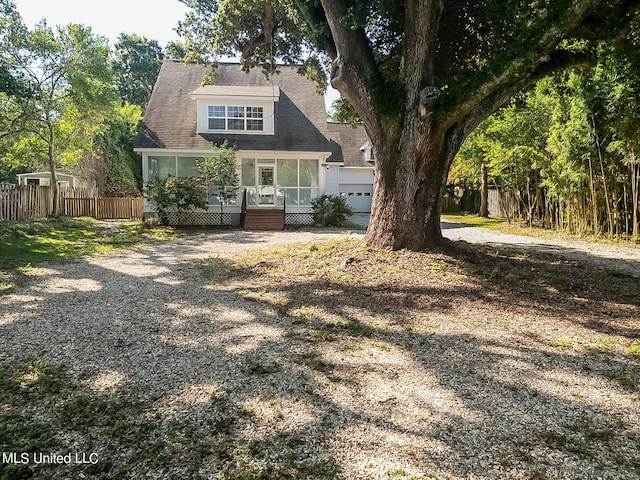 view of front of property featuring a garage