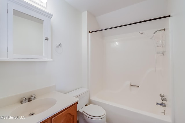 full bathroom featuring vanity, bathtub / shower combination, and toilet