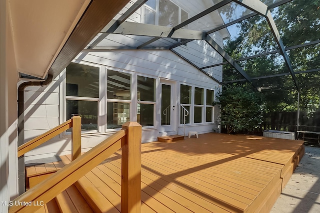 wooden deck featuring a lanai