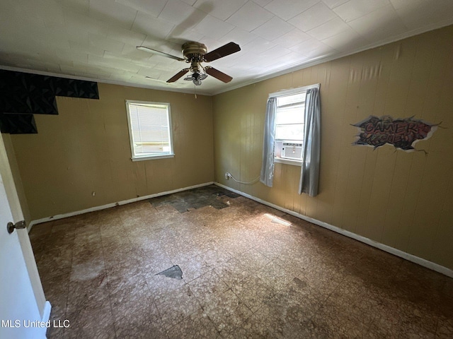 117 SE 5th Ave, Magee, MS 39111 - unfurnished bedroom with ornamental molding, cooling unit, a ceiling fan, and tile patterned floors