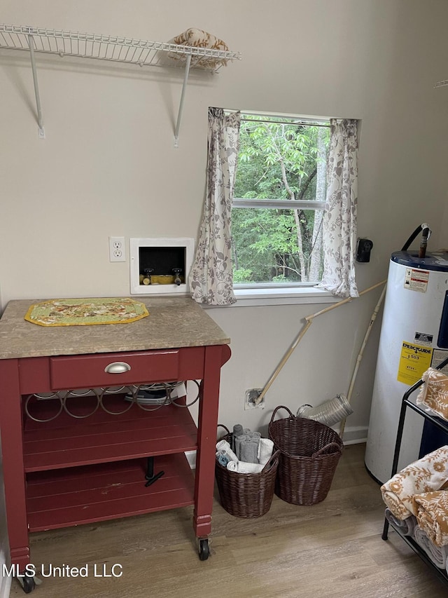interior space featuring water heater and wood finished floors