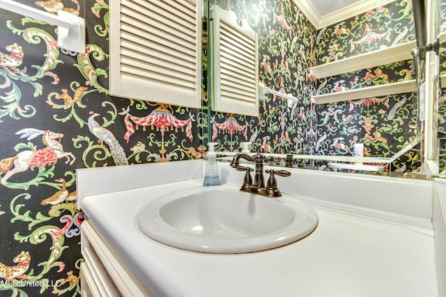 bathroom featuring vanity, radiator, and crown molding