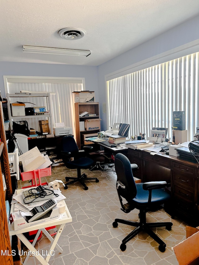 708 Ratliff Ferry Rd, Canton, MS 39046 - home office featuring a textured ceiling
