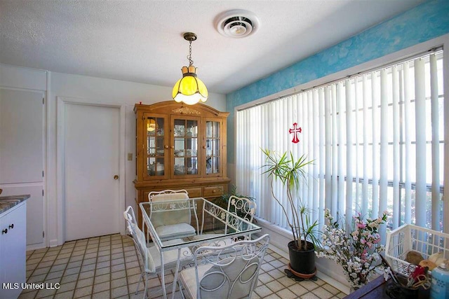 708 Ratliff Ferry Rd, Canton, MS 39046 - tiled dining area featuring plenty of natural light