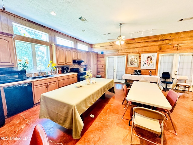 708 Ratliff Ferry Rd, Canton, MS 39046 - kitchen with log walls, french doors, sink, and black appliances