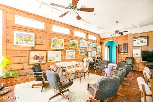 708 Ratliff Ferry Rd, Canton, MS 39046 - living room with wood walls and track lighting