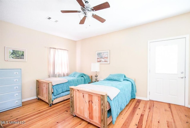 708 Ratliff Ferry Rd, Canton, MS 39046 - bedroom featuring light hardwood / wood-style flooring and ceiling fan