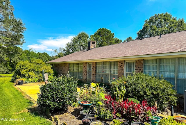 708 Ratliff Ferry Rd, Canton, MS 39046 - view of home's exterior featuring a yard