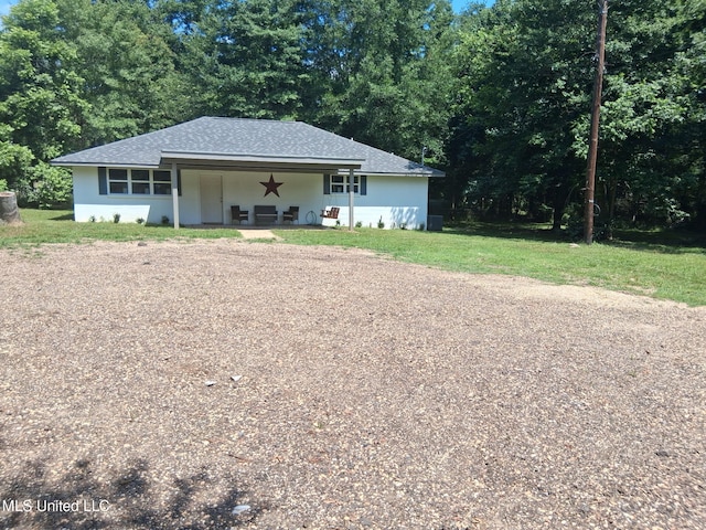 106 Edd Monk St, Mendenhall, MS 39114 - view of front of property with a front yard and roof with shingles