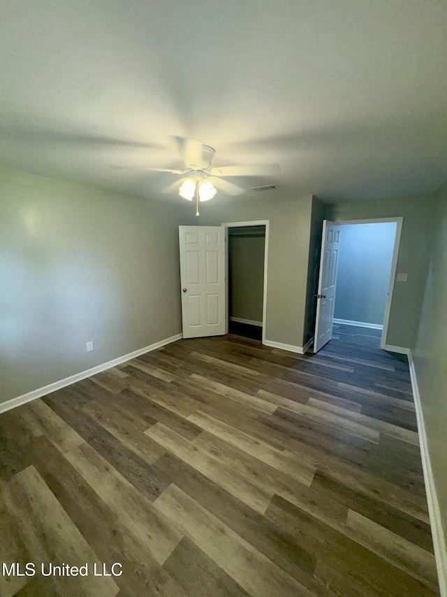 106 Edd Monk St, Mendenhall, MS 39114 - unfurnished bedroom with dark wood-style floors, a closet, and ceiling fan