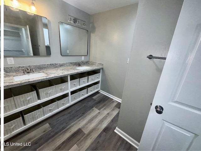 106 Edd Monk St, Mendenhall, MS 39114 - full bath featuring wood finished floors and double vanity