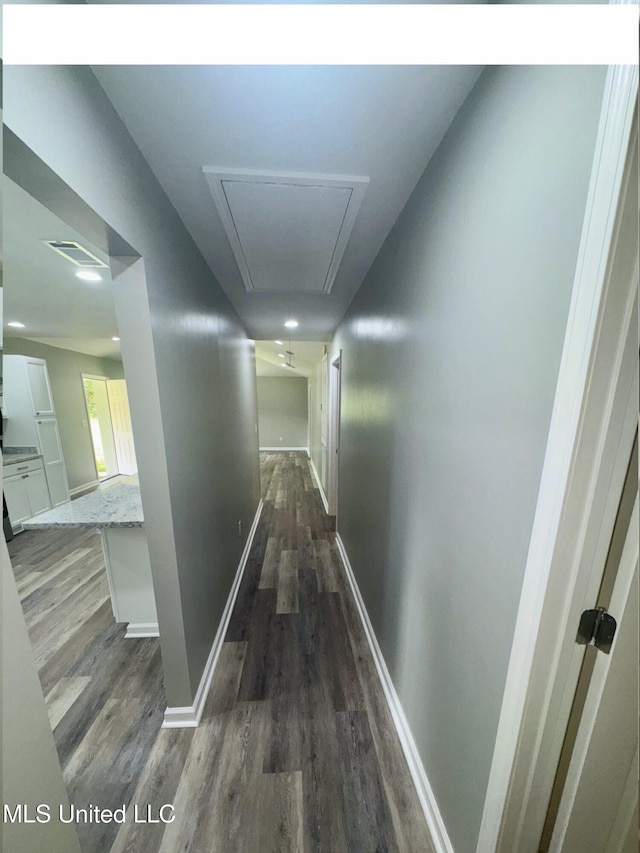 106 Edd Monk St, Mendenhall, MS 39114 - corridor with attic access and dark wood finished floors