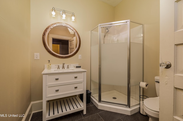 bathroom with toilet, vanity, tile patterned floors, and an enclosed shower