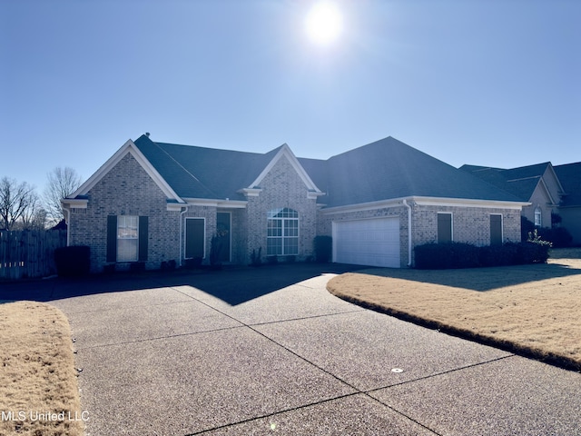 single story home featuring a garage