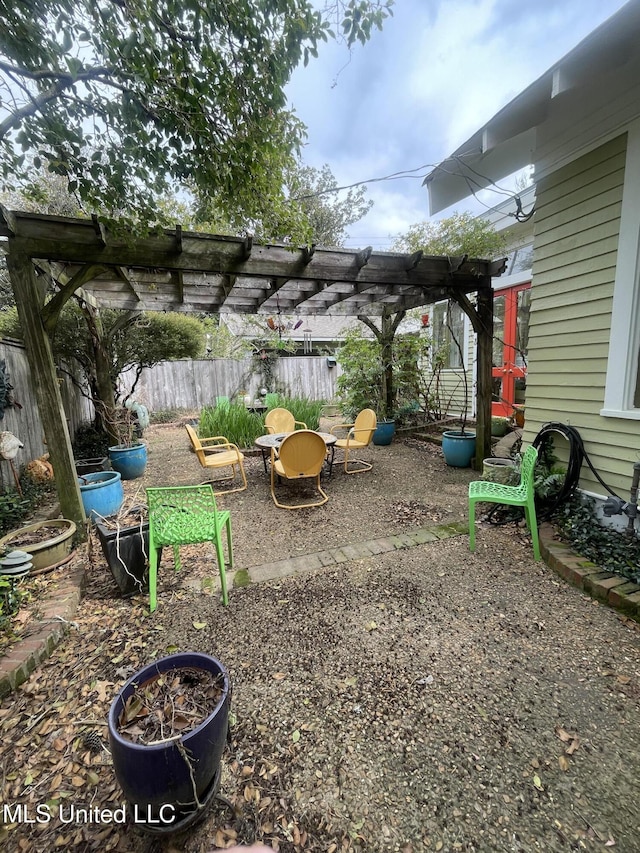 800 Gillespie St, Jackson, MS 39202 - view of yard featuring fence, a pergola, and a patio