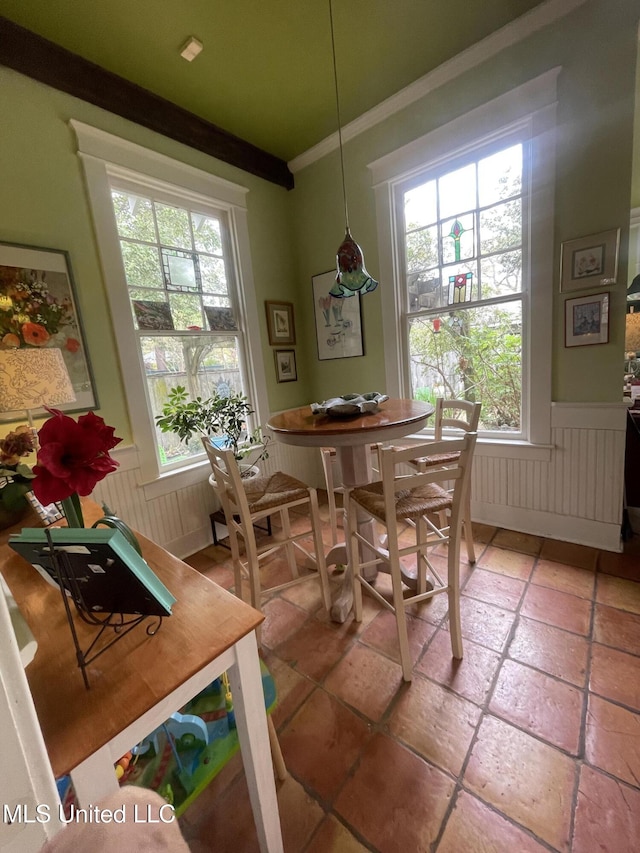 800 Gillespie St, Jackson, MS 39202 - dining space featuring ornamental molding, wainscoting, and stone tile flooring