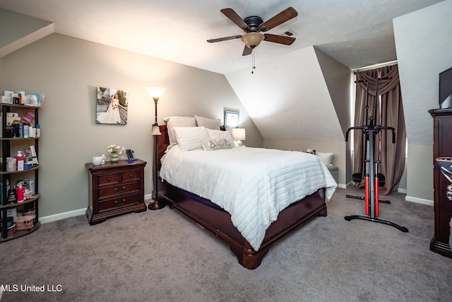 carpeted bedroom featuring vaulted ceiling and ceiling fan