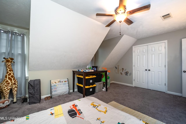 bedroom featuring vaulted ceiling, ceiling fan, and dark carpet