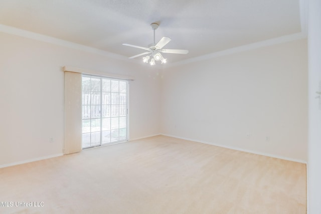 696 Aukai Pl, Diamondhead, MS 39525 - carpeted empty room with ceiling fan, baseboards, and crown molding