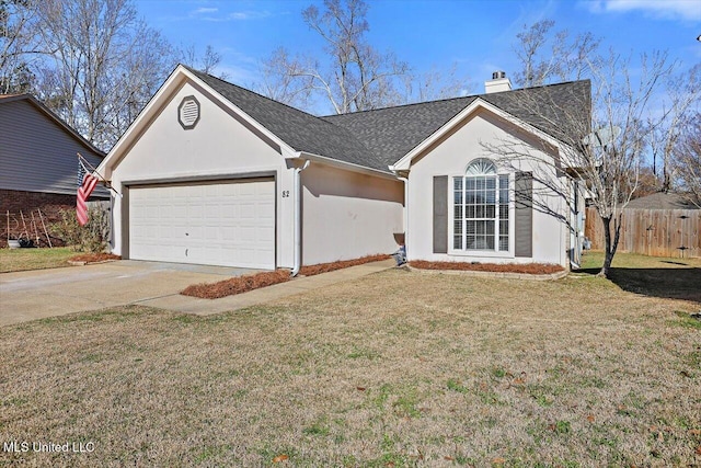 single story home featuring a front yard and a garage