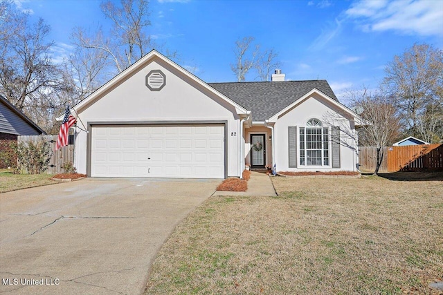 ranch-style home featuring a front lawn and a garage