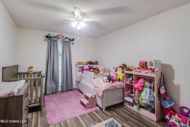 730 Holly Hills Dr, Biloxi, MS 39532 - bedroom with wood finished floors and ceiling fan